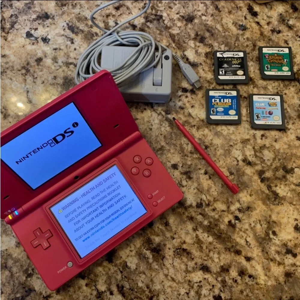 DS Pink Console, Stylus  Pen, Four (4) Games & Charger